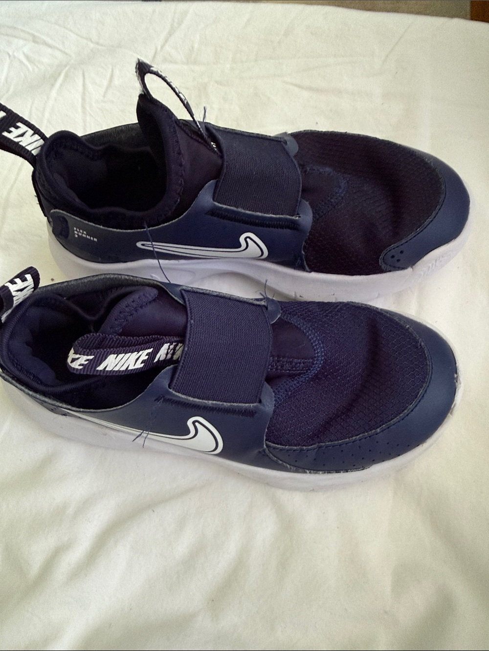Nike Kids Navy and White Slip-On Sneakers